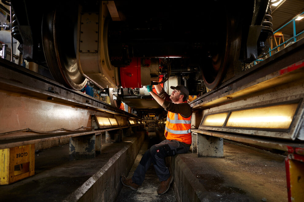 Danfoss Engineer Working On A Train by Peter Dibdin commercial photographer based in Edinburgh Scotland