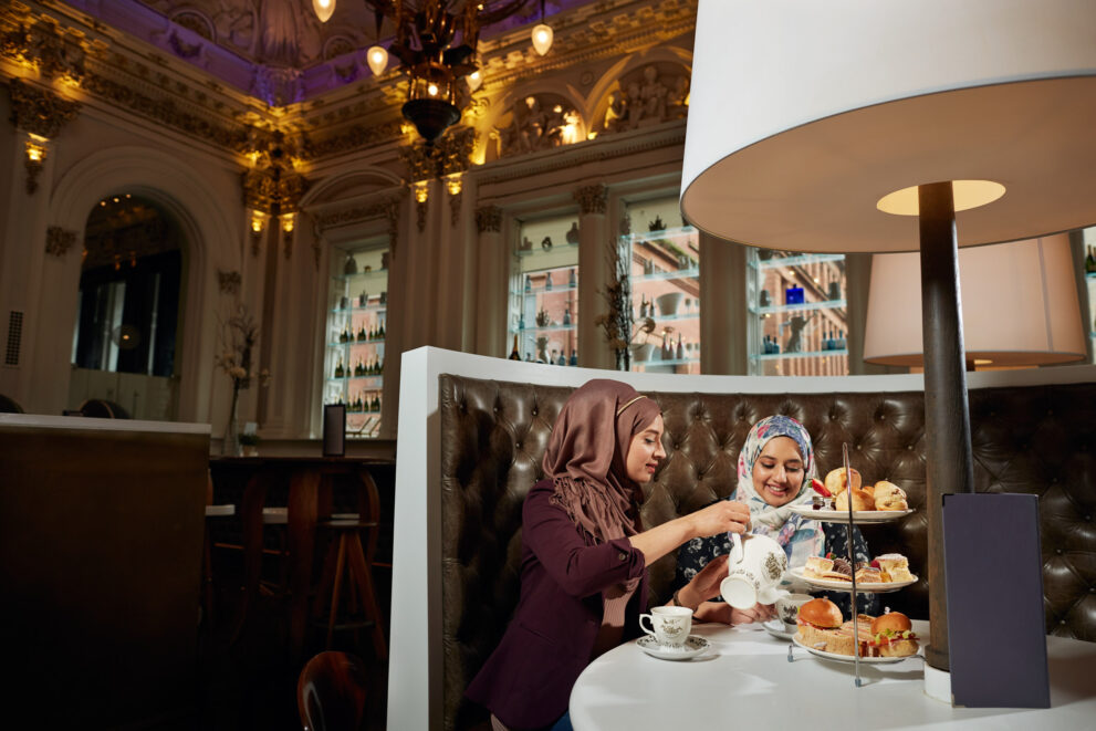 Two Muslim Women Enjoy Afternoon Tea At The Corinthian Glasgow Peter Dibdin commercial photographer based in Edinburgh Scotland